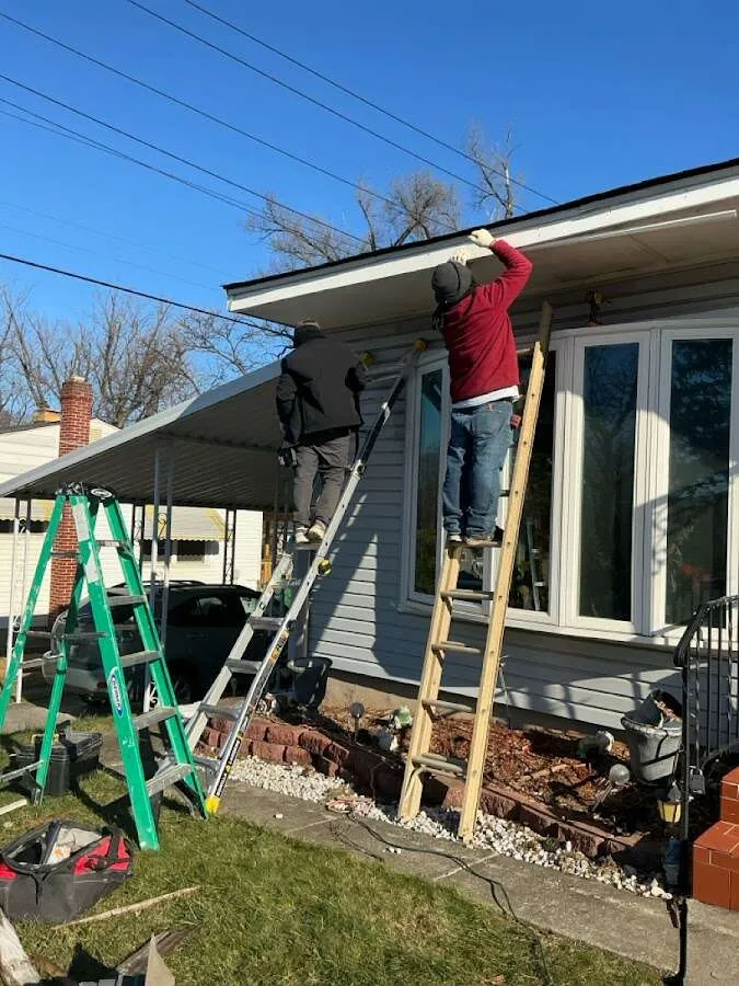 Restoration crew performing exterior repair in Cypress Gardens