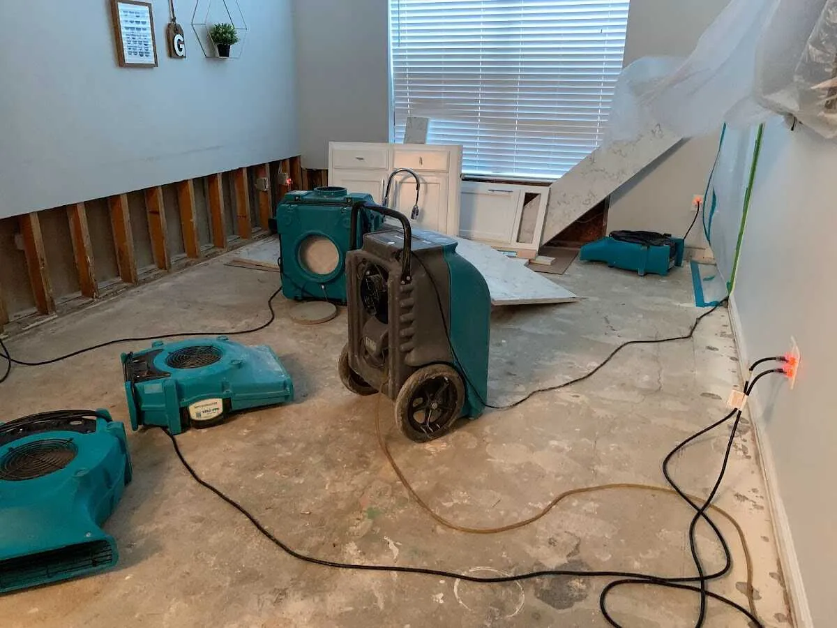 Dehumidifier in flood-cut room for Water Damage Restoration in Cypress Gardens